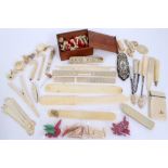 Large collection of assorted antique ivory items - to include various chess pieces, card case,