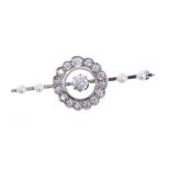 Edwardian diamond and cultured pearl bar brooch with a central old cut diamond surrounded by
