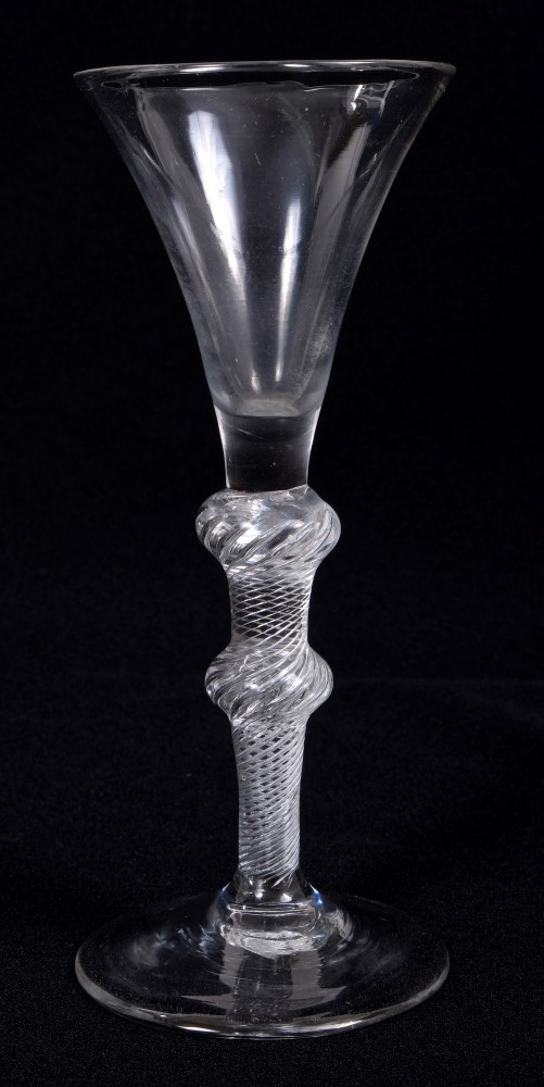 Georgian wine glass with trumpet bowl with double opaque air-twist stem on splayed foot,