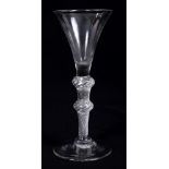 Georgian wine glass with trumpet bowl with double opaque air-twist stem on splayed foot,