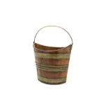 Early 19th century fruitwood and brass bound peat bucket of navette coopered form,