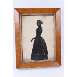 19th century full-length silhouette portrait of a young lady, in original glazed maple frame,