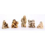 Five 19th century Japanese carved ivory netsukes - including warrior, boy with cauldron, etc,