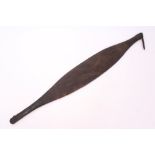 Antique Polynesian paddle club of typical swollen form, with angular protruding point to one end,
