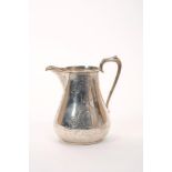 Victorian silver milk jug of baluster form,