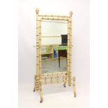 19th century polychrome painted faux bamboo cheval mirror with rounded rectangular mirrored plate