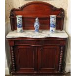 Victorian mahogany chiffonier with ledge back above marble top and shaped frieze drawer over a pair