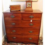 Regency mahogany chest of two short and three long drawers with oval brass handles, on bracket feet,