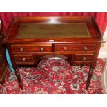 Victorian mahogany writing table with leather inset top above four drawers to the kneehole,