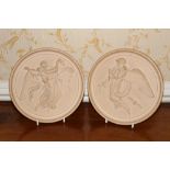 Pair of antique Danish terracotta circular plaques by P.