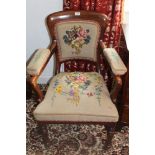 Pair of Victorian mahogany open elbow chairs with tapestry upholstered seats, back and arms,