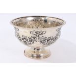 Edwardian silver rose bowl (London 1903) of hemispherical form with embossed garland ornament on