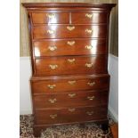 George III mahogany chest on chest with dentil cornice and two short over three long graduated