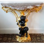 Decorative gilt and ebonised pier table with shaped rouge marble top supported by two blackamoors