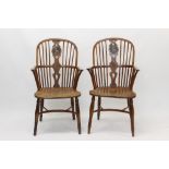 Rare pair of early 19th century yew and elm Windsor chairs each with polychrome painted armorial