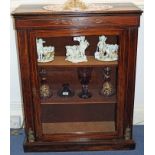 Late Victorian rosewood and line-inlaid pier cabinet enclosed by a glazed door on plinth base,