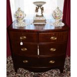 Regency mahogany bow front chest of two short and two long drawers, on bracket feet,
