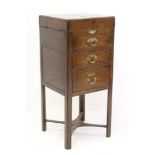 George III oak washstand with fold-out top over drawers, on square supports,