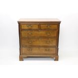 George III oak and fruitwood crossbanded chest of drawers,