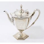 1930s silver teapot of tapered hexagonal form with urn knop and reeded and foliate borders,