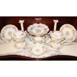Collection of Coalport Strange Orchid pattern tablewares to include candlesticks and urns and