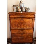 Nineteenth century Continental figured walnut secrétaire à abattant with cushion frieze drawer and