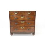 Good George II fruitwood chest of two short over three long drawers, on replaced bun feet,