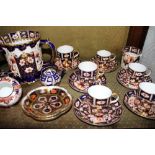 Group of six similar Royal Crown Derby Imari coffee cups and saucers, a large three-handled tyg,