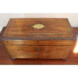 Regency rosewood and brass inlaid tea caddy with beaded borders and twin loop handles,