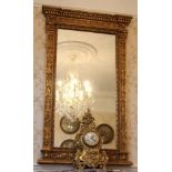 Regency-style gilt framed pier mirror with anthemium ornament,