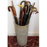 Collection of silver mounted and other walking canes and umbrellas,