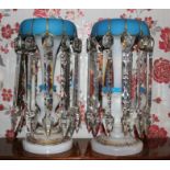 Pair of Victorian milk glass lustres with blue glass borders and prismatic drops,