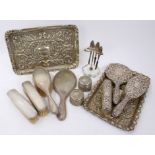 Two silver part dressing table sets,