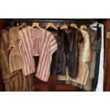 Collection of seven vintage fur coats and shawls including mink and two other vintage dresses