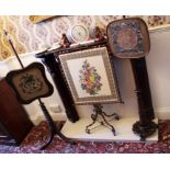 Two Victorian pole screens with beadwork banners and another metal framed fire screen (3)