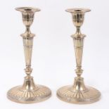 Pair George V Neo-Classical-style candlesticks by William Hutton & Sons Ltd (London 1910) each with