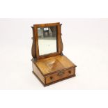 19th century Dutch walnut swing frame toilet mirror, square mirrored plate, drawer below,