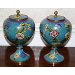 Pair of early twentieth century Japanese cloisonné jars and covers of bulbous form on spread foot