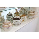 Group of seven eighteenth / nineteenth century English porcelain teapots by Derby,