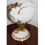 Royal Worcester blushed ivory nautilus-form spill vase with gilt lizard ornament,