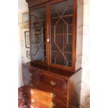 George III mahogany and inlaid secretaire bookcase,