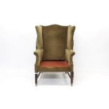 George III style mahogany wing armchair,
