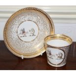 Early nineteenth century Chamberlain's Worcester porcelain cup and saucer with twin armorials on