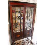 Edwardian mahogany display cabinet with glass shelves enclosed by astragal glazed doors,