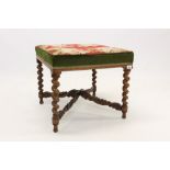 Victorian walnut footstool with tapestry upholstery,