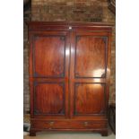 Edwardian mahogany double wardrobe with dentil cornice and twin panelled doors with single drawer