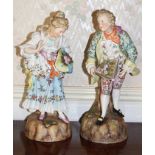 Pair of early twentieth century Sinzendorf porcelain figures of an eighteenth century gentleman and