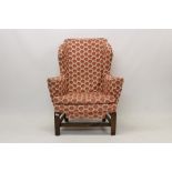 Early 18th century provincial wing armchair,