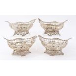 Set of four Victorian silver sweetmeat baskets by William Comyns (London 1895) each of diaper