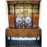 Late eighteenth century oak and dog-tooth inlaid high dresser,